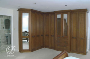 Lemari Pakaian Sudut Minimalis Jati Modern